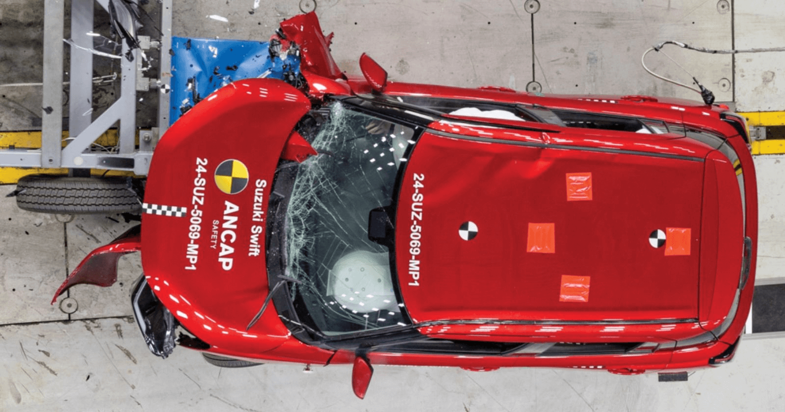 Swift N CAP testing top view of red maruti swift while being tested